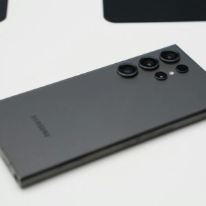 Detailed close-up shot of a sleek Samsung smartphone highlighting its advanced camera lenses.
